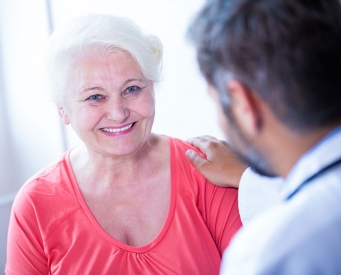 older woman at the doctor