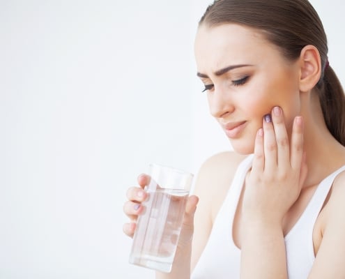 woman with tooth pain