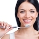 Woman holding a toothbrush