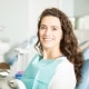 Young woman smiling at the dentist