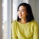 Young woman smiling with orthodontic treatment