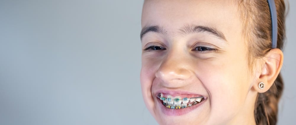 Young girl wearing braces