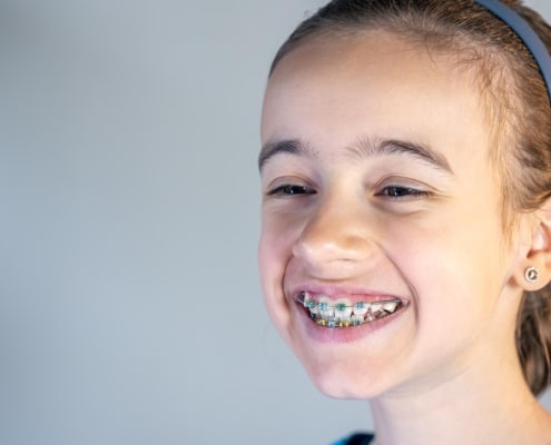 Young girl wearing braces